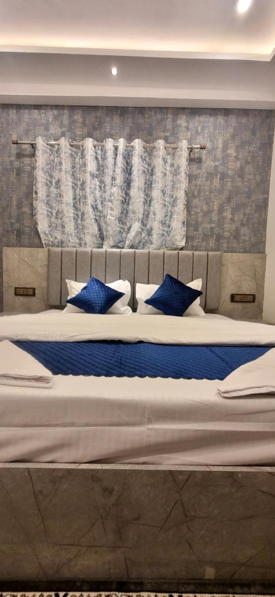 Mm Grand Hotel Váránaszi Kültér fotó